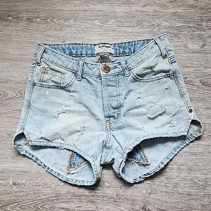 Light Wash Distressed Denim Shorts - Women's